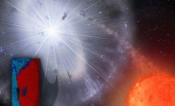 El grano de polvo fue lanzado por una estrella que explotó antes del nacimiento del Sistema Solar. Su análisis reveló grafito rico en carbono (rojo) con material rico en oxígeno (azul)