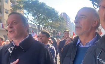 Álvaro Delgado y Pablo Mieres en acto del PIT-CNT por el Día de los Trabajadores