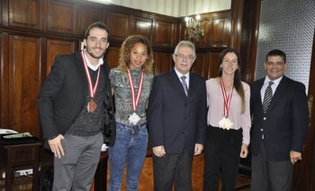 Lasa, Aires y Fernández junto al ministro Menéndez y al presidente de la CAU De Mello