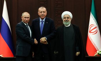 Putin (izquierda), Erdogan (centro) y el expresidente de Irán, Hassan Rouhani, en una reunión de 2019