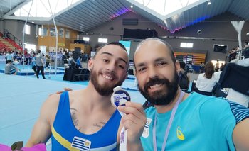 Rostagno luce orgulloso su medalla con Martínez